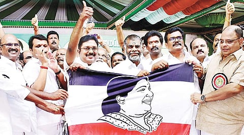 RK Nagar MLA T T V Dhinakaran unveiling his new party’s flag at Melur in Madurai district on Thursday | K K sundar