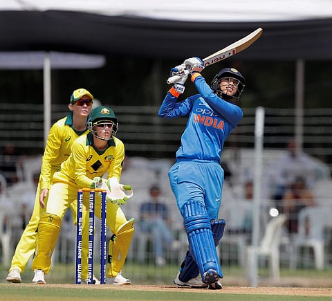 Indian cricketer Smriti Mandhana plays a shot during the second ODI cricket match played against Australian at Reliance Stadium in Vadodara on Thursday. | PTI