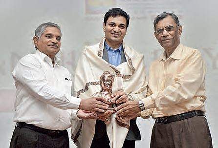 Gitam Pro VC Prof N Siva Prasad felicitating  Kunal Kirti, Director-HR, Dr Reddy’s Labs on their campus in Hyderabad on Friday | Express