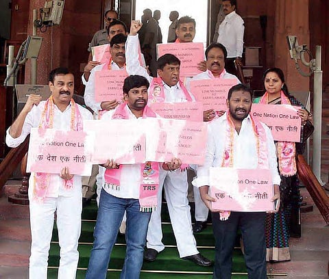 For the tenth consecutive day, TRS MPs protest outside the Parliament demanding increase in quota of reservations, in New Delhi on Thursday | Shekhar yadav