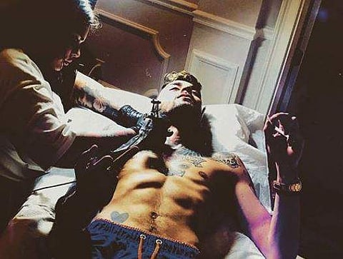 Singer Zayn Malik being tattooed. (Image Courtesy Instagram handle)