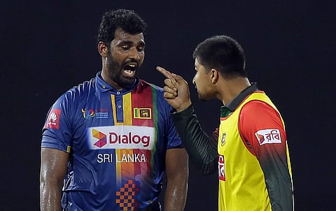 Nurul Hasan (R) was fined for his behaviour towards Thisara Perera (File | AP)