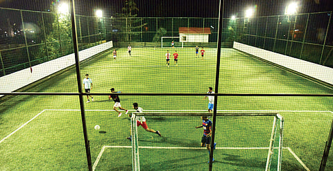 Hemmed in by a fencing and installed with floodlights, pay-to-play spaces offer the convenience of timing. Youngsters enjoying a session at the Jogo Football Arena in Chilavannur, Kochi | Albin Mathew