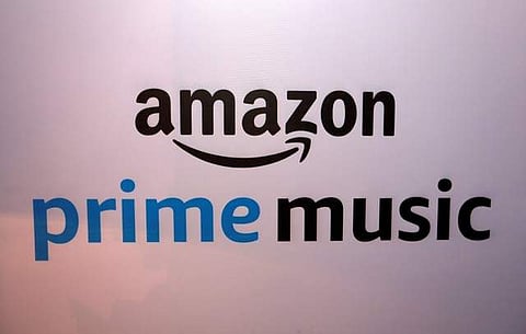 A banner displaying the Amazon Prime Music logo is seen in Mumbai. | REUTERS