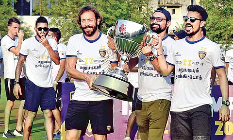 Chennaiyin FC players celebrate their Indian Super League title win with fans in Chennai on Sunday. This was their second win after 2015. (D Sampathkumar | EPS)
