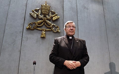 Church says Cardinal George Pell returning to Vatican in crisis