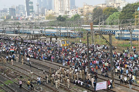 A flash agitation by job-seekers over issues pertaining to railway recruitment has culminated in a rail-blockade, police caning and retaliatory stone-throwing leading to a virtual paralysis of the Central Railway suburban train services in Mumbai on Tuesday. (Express Photo Service)