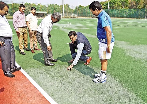 The 2004 Olympic silver medallist shooter takes a close look at the hockey turf. | Nagaraja Gadekal