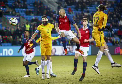 A hat-trick from LA Galaxy striker Ola Kamara and a fine header from Tore Reginiussen helped Norway to beat Australia 4-1 at Olso. It was Australia's first outing under Dutchman Bert van Marwijk, who took the Netherlands to the finals of 2010 World Cup. E