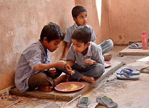 School children at Hyderabad Government High School shares mid day meal. (Express photo | Vinay Madapu)