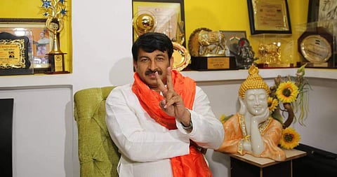BJP Delhi Pardesh president Manoj Tiwari showing victory sign after MCD election results in New Delhi on Wednesday. (Shekhar Yadav | EPS)