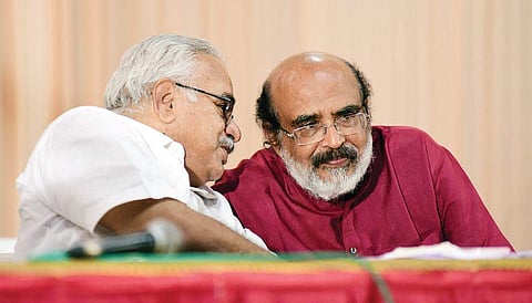 Finance Minister T M Thomas Isaac interacting with CPI leader Kanam Rajendran during the 23rd CPI Party Congress seminar at the Town Hall in Kochi  on Saturday | Albin Mathew