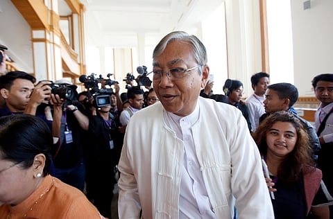 Myanmar's president Htin Kyaw, center,  resigned last week. (File | AP)
