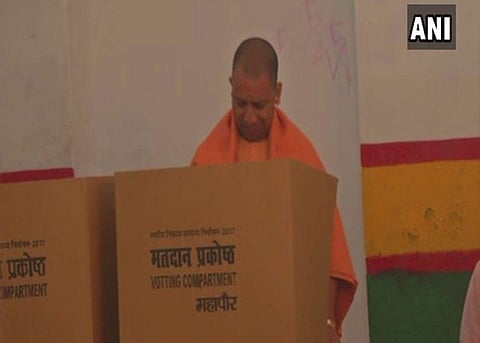 Uttar Pradesh Chief Minister Yogi Adityanath at a polling station in Gorakhpur to cast his vote. | ANI