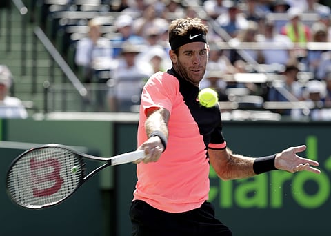 Juan Martin del Potro, of Argentina, returns to Filip Krajinovic, of Serbia, during the Miami Open. | AP