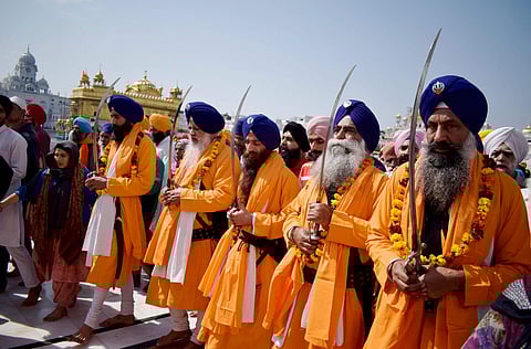 Hola Mohalla is a Sikh festival which is celebrated a day after the Hindu festival Holi.  Guru Gobind Singh, the tenth Sikh Guru, was the first to start the celebrations. The festival lasts for three days. The word Holla Mohalla stands for 'the charge of 