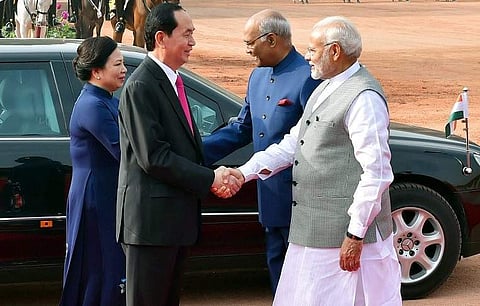 Prime Minister Narendra Modi greets Vietnamese President Tran Dai Quang. | Photo: PTI