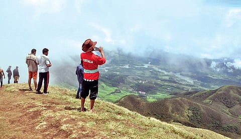 Tourists enjoying the scenery at Meesapulimala | Vincent Pulickal
