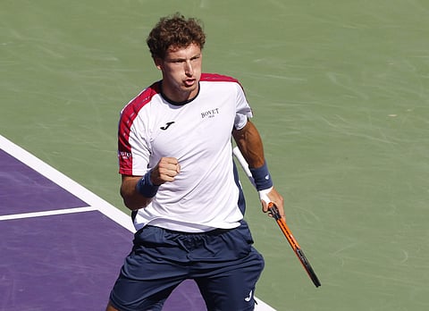 Pablo Carreno Busta reacts after winning the first set against Kevin Anderson during their quarterfinal match at the Miami Open. | AP