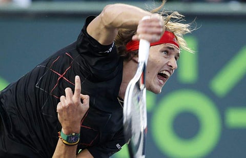 Alexander Zverev serves to Pablo Carreno Busta during a semifinal tennis match at the Miami Open. | AP