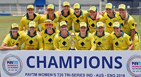 Australian players celebrate thier victroy against England in the Tri-nation Women's T20I Series final match in Mumbai. | PTI