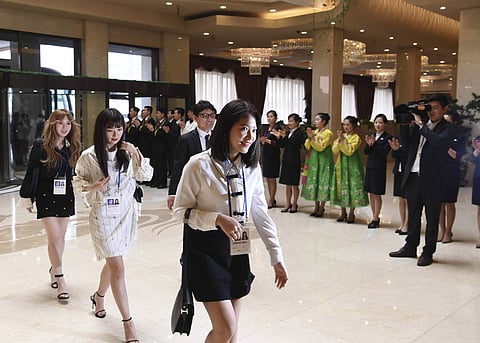 South Korean popular girl band Red Velvet arrives at a hotel in Pyongyang. | AP