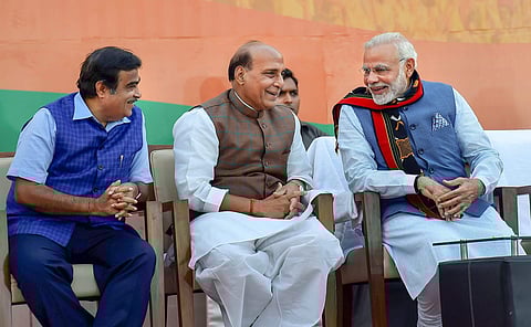 Prime Minister Narendra Modi with Party leaders during a meeting after their victory in North-East Assembly election at party headquarters in New Delhi on Saturday. (PTI)