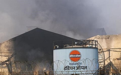 Smoke rises from a depot of state-run Indian Oil Corp (IOC) in Taloja, Mumbai. (File | Reuters)