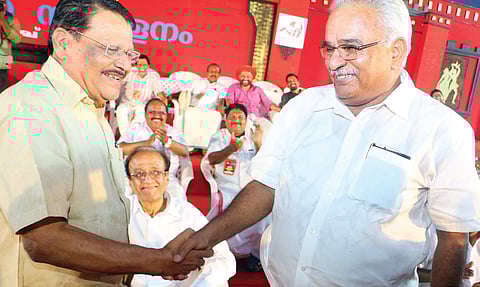 National executive member K E Ismail greeting newly-elected CPI state secretary Kanam Rajendran during the valedictory function of the party’s state conference in Malappuram on Sunday | T P Sooraj