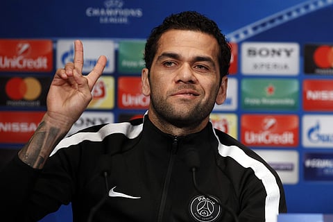 PSG's defender Dani Alves attends a press conference on the eve of the Champions League Round of 16 second leg soccer match between Paris Saint Germain and Real Madrid. | AP