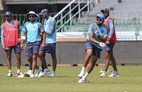 India's captain Rohit Sharma, second right, participates in a fielding practise session ahead of the tri-nation Twenty20 cricket series in Colombo, Sri Lanka, Monday, March 5, 2018. The Twenty20 tri-series that features Bangladesh, India and Sri Lanka beg