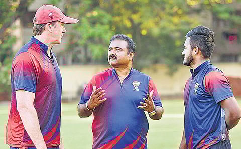 Australia’s pace legend Glenn McGrath (left) with coach M Senthilnathan (centre)  at the MRF Pace Foundation in Chennai on Monday | D Sampathkumar