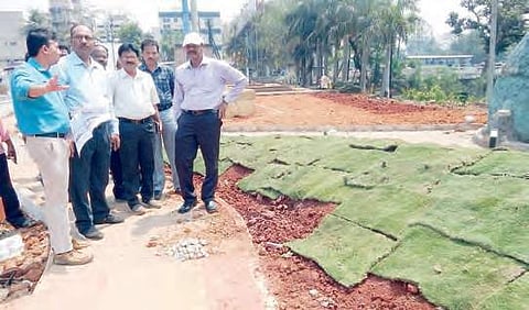 Municipal commissioner J Nivas, along with AP Urban Greening and Beautification Corporation MD Chandramohan Reddy inspecting the park | Express