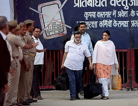 Rajesh and Nupur Talwar come out of Dasna Jail, after they were acquitted by the Allahabad High Court charges of murdering their daughter Aarushi and their domestic help Hemraj - PTI
