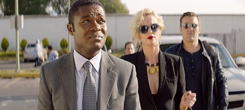 This image released by Amazon Studios shows David Oyelowo, from left, Charlize Theron and Joel Edgerton in a scene from 'Gringo.' | AP