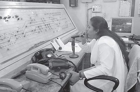 A woman staffer keeps track of train movements at Hijli railway station | EXPRESS