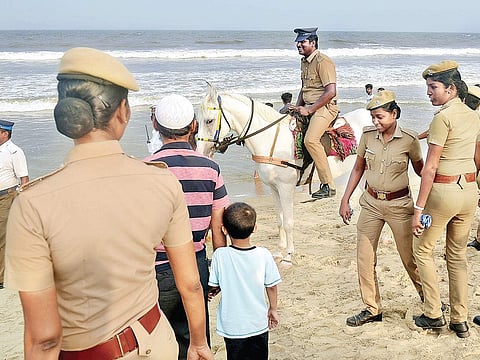 A policeman riding a horse borrowed from a local horse owner on the Marina. Police personnel were deployed to prevent any protests over the Cauvery issue | D SAMPATHKUMAR