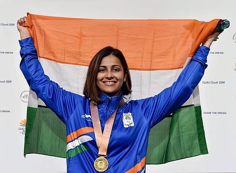 Heena Sidhu holds tricolour during the medal ceremony after winning gold in the Women s 25m Pistol final | PTI