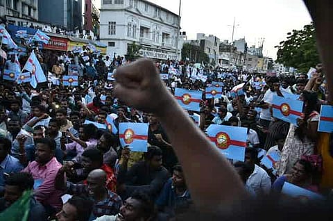 The police on Tuesday took into custody members of various organisations protesting against the holding of Indian Premier League (IPL) match between Chennai Super Kings and Kolkata Knight Riders in Chennai. (EPS | P Jawahar)