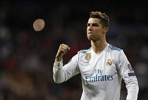 Real Madrid's Cristiano Ronaldo celebrates at the end of a Champions League quarter final second leg soccer match between Real Madrid and Juventus at the Santiago Bernabeu stadium in Madrid, Wednesday, April 11, 2018. | AP