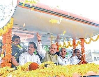 Amit Shah and B S Yeddyurappa at a roadshow in Gokak on Friday  | Express