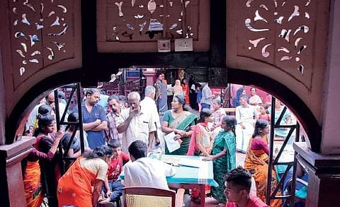 A doctor checking a patient in a special counter set up at the Thiruvananthapuram General Hospital on Friday. The disruption of services due to the strike called by a section of doctors against the decision to extend OP hours brought hardships to scores o