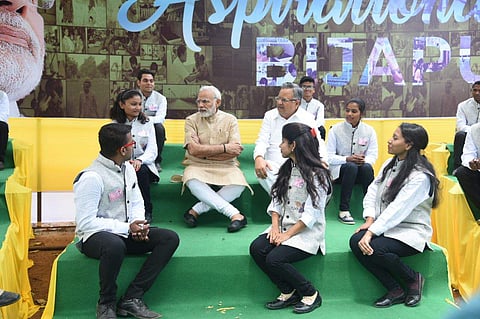 PM Narendra Modi interacting with the youths on Saturday in Maoist affected Bijapur, which is identified as among the 115  inspirational districts of the country  by the NITI Aayog. (EPS)