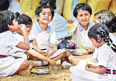 Representative photo of children having a meal at a city school