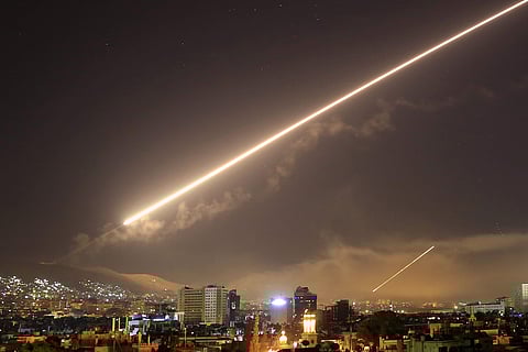 Damascus skies erupt with surface to air missile fire as the U.S. launches an attack on Syria targeting different parts of the Syrian capital Damascus. (File Photo | AP)