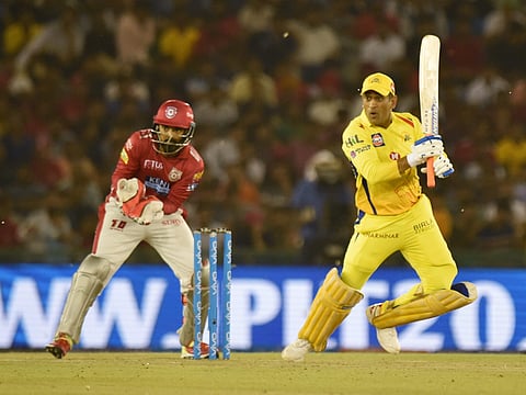 Chennai Super Kings captain M S Dhoni plays a shot during IPL T20 match against Kings XI Punjab in Mohali on Sunday. (PTI)