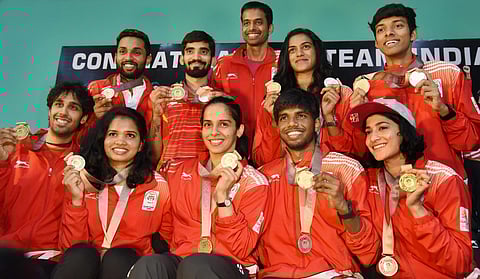 Shuttlers Saina Nehwal Kidambi Srikanth PV Sindhu and other players show their Commonwealth medals at a press conference in Hyderabad on Tuesday. Coath Gopichand is also seen. | PTI