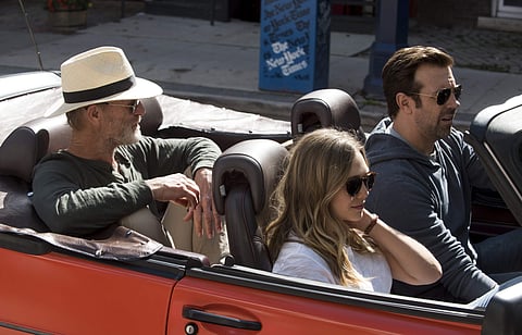 This image released by Netflix shows Ed Harris, from left, Elizabeth Olsen and Jason Sudeikis in a scene from 'Kodachrome.' | AP