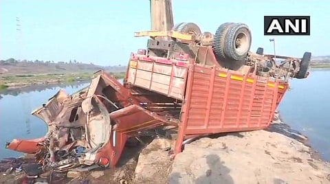 The vehicle fell around 60-70 feet down on the dry part of the river after it hit the retaining wall of Jogdaha bridge near Amelia, an official said. | ANI/Twitter