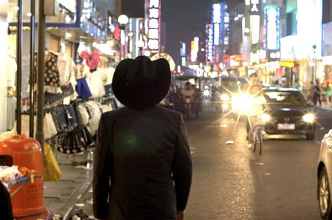Ghostbox Cowboy: What happens when a Texan businessman lands in China's Silicon Valley? This film by John Maringouin describes the character's (Jimmy Van Horn played by David Zellner) experience in Shenzhen, a city which was once a simple fishing village. (Photo | Tribecca official website)